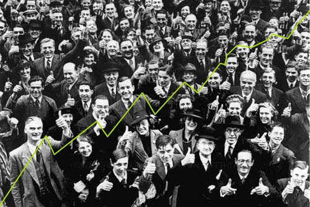 A crowd of smiling men behind a rising green line